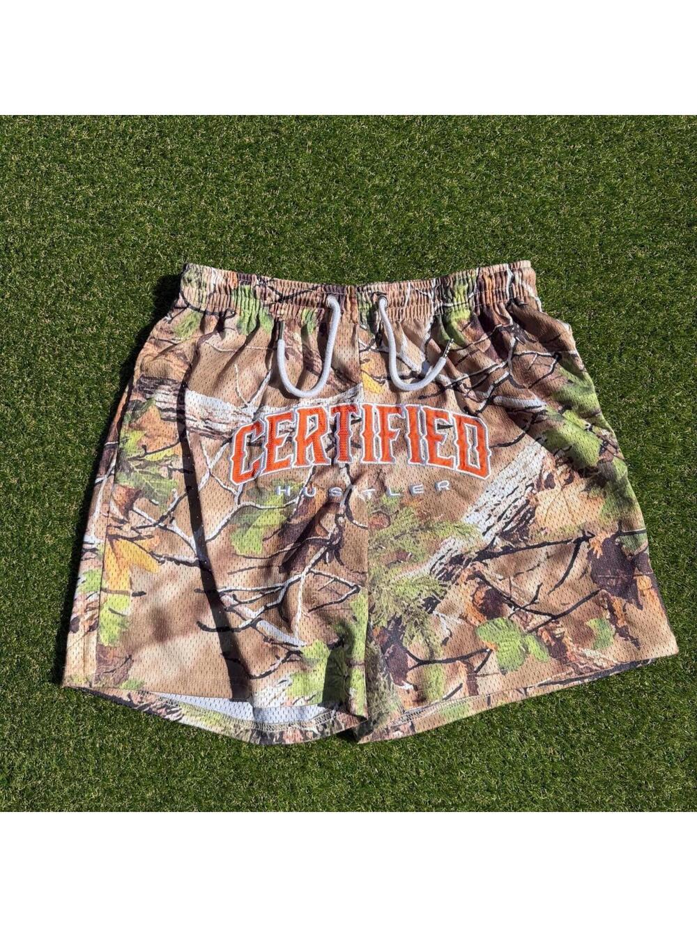 Rockstar Original "Certified Hustler" mesh shorts in camo - M